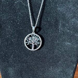 Silver Tree of Life Pendant Necklace with blue diamond chips.